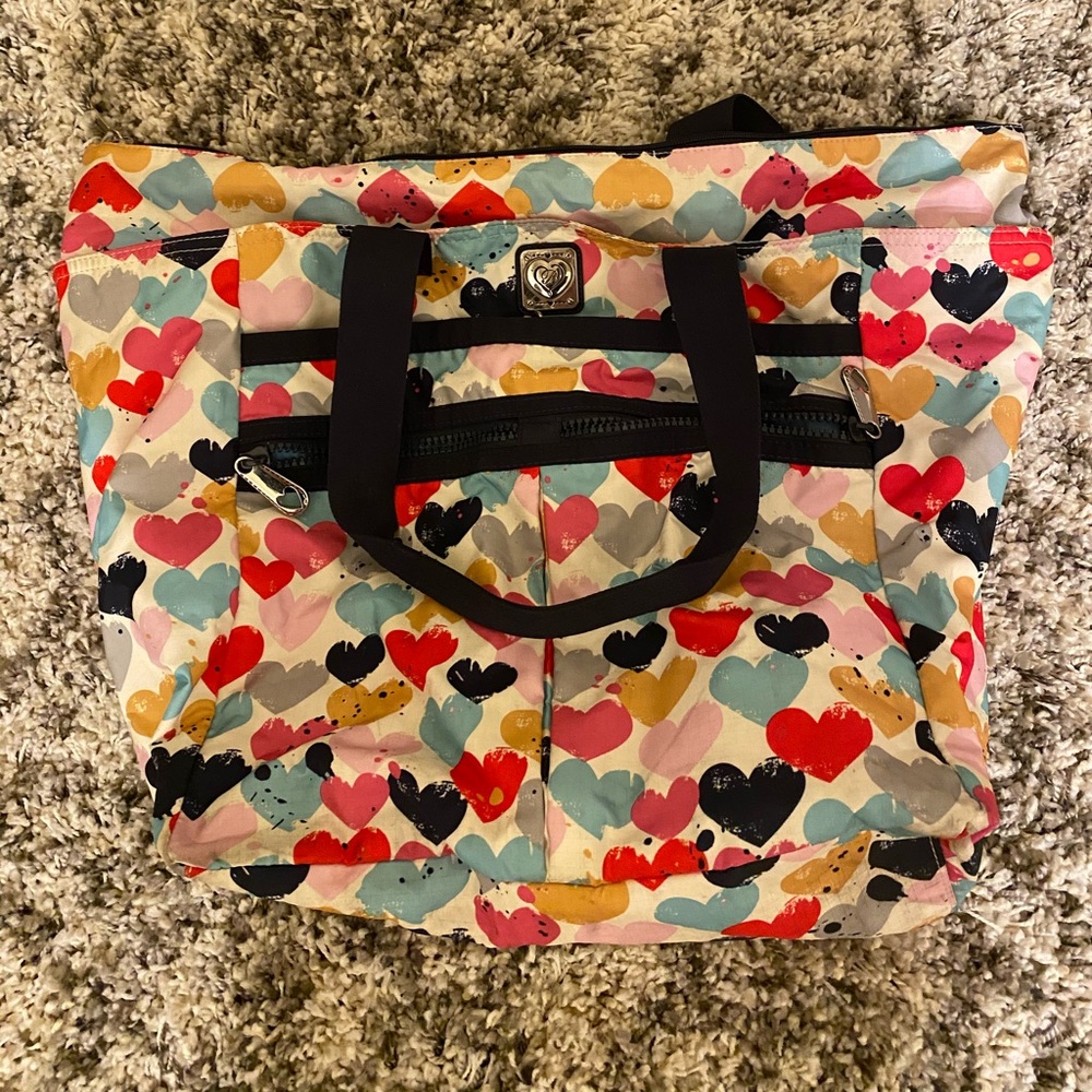 Overnight bag with heart detail and silver zippers